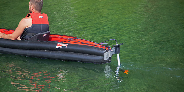 Electric motor on kayak, canoe, sailing catamaran, motorboat
